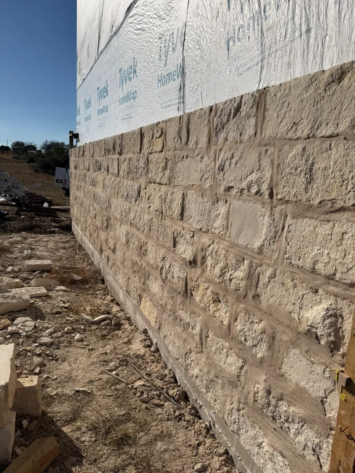 Concrete foundation with moisture barrier and control joints during construction phase
